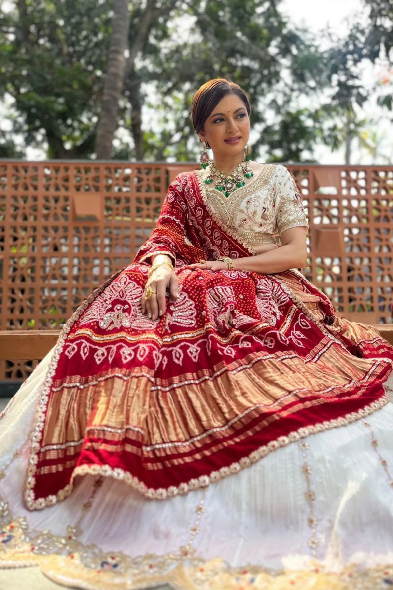 Ivory Peacock Lehenga Set Paired With Red Bandhani Dupatta