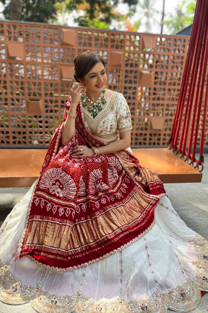 Ivory Peacock Lehenga Set Paired With Red Bandhani & Dupatta - Bandhani