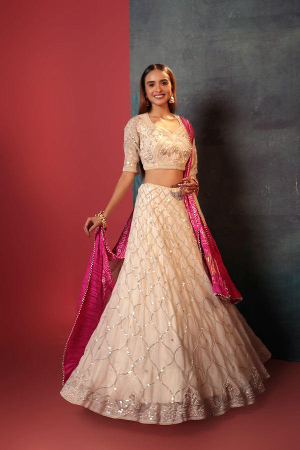 Off-white Zardosi Blouse Paired With Zardosi Lehenga & Bandhani Dupatta - Bandhani