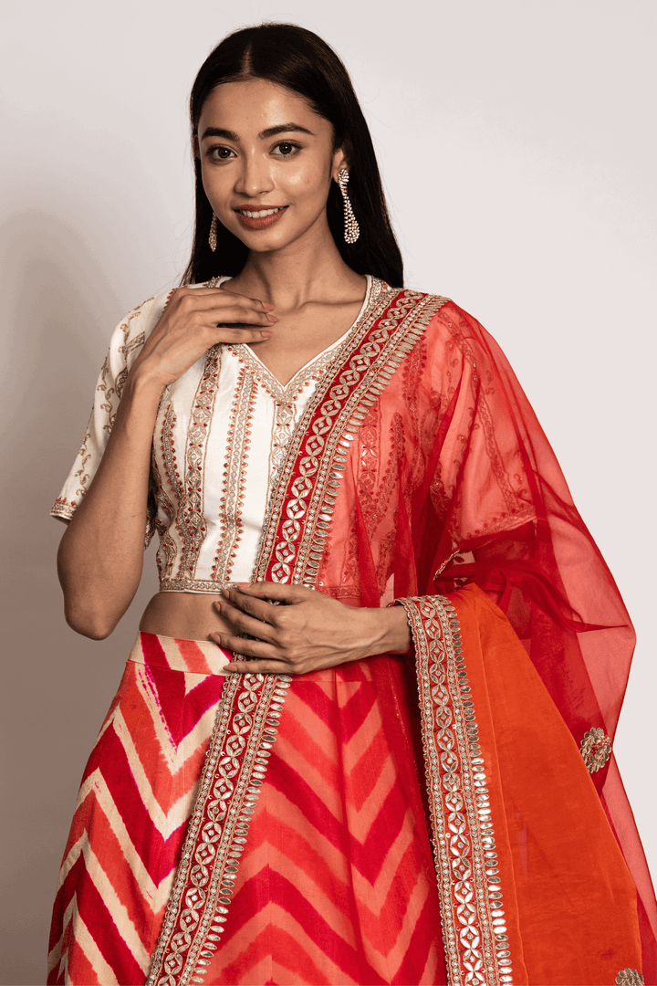 Off White Gota Blouse Paired With Rust Leheriya Skirt And Organza Dupatta - Bandhani