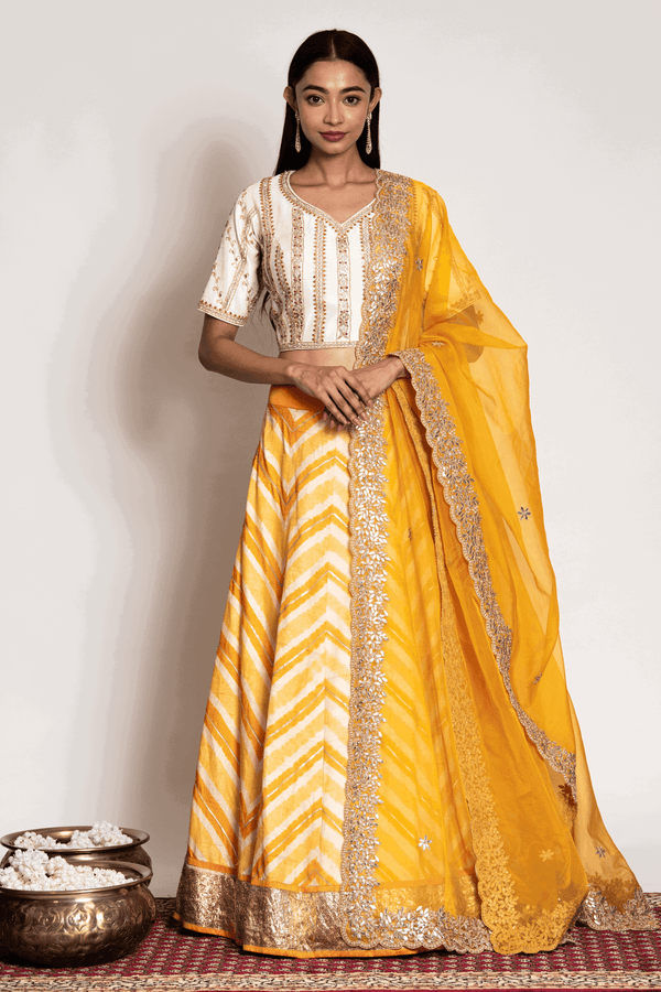 Off White Gota Blouse Paired With Yellow Leheriya Skirt And Organza Dupatta - Bandhani