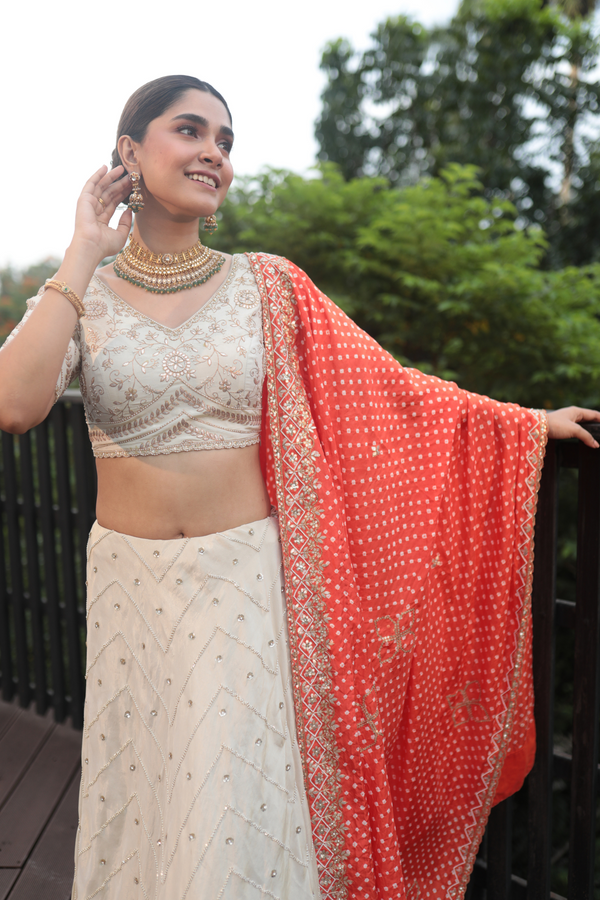 Offwhite Tissue Gotapatti Lehenga With Orange Bandhani Dupatta - Bandhani