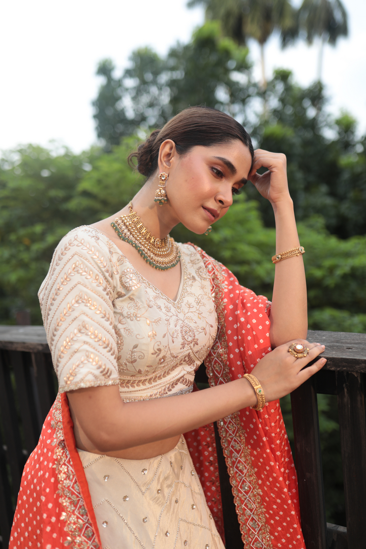 Offwhite Tissue Gotapatti Lehenga With Orange Bandhani Dupatta - Bandhani