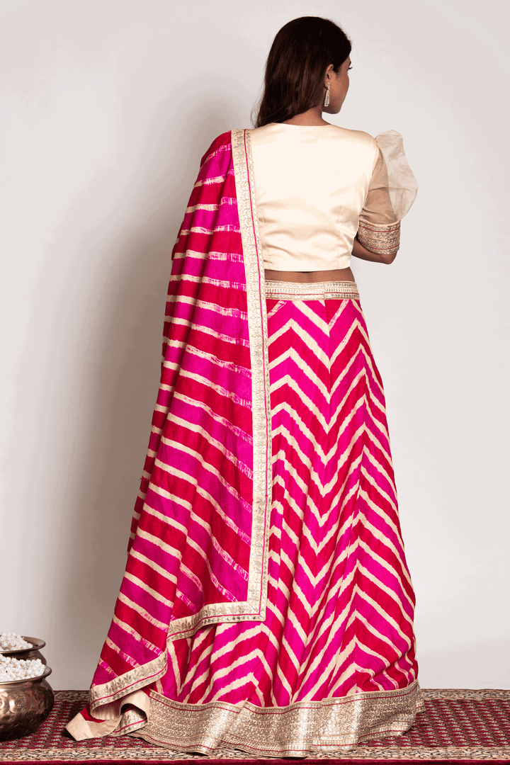 Puff Sleeves Crop Top Paired With Pink Leheriya Skirt And Dupatta - Bandhani