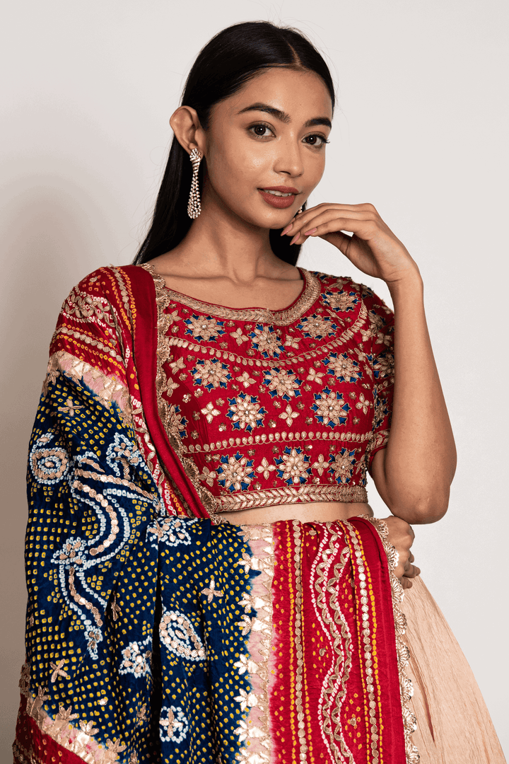 Red Gota Blouse Paired With Chikoo Crush Skirt and Bandhani Dupatta - Bandhani